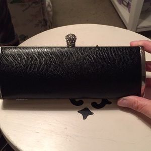 Black embossed and silver evening bag